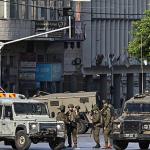 تصعيد ميداني في الخليل والقدس: اعتقالات وتجريف أراضٍ واعتداءات للمستوطنين