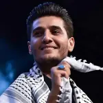 محمد عساف يلغي حفلاته في أمريكا بعد جدل خلال حفل ميشيغان