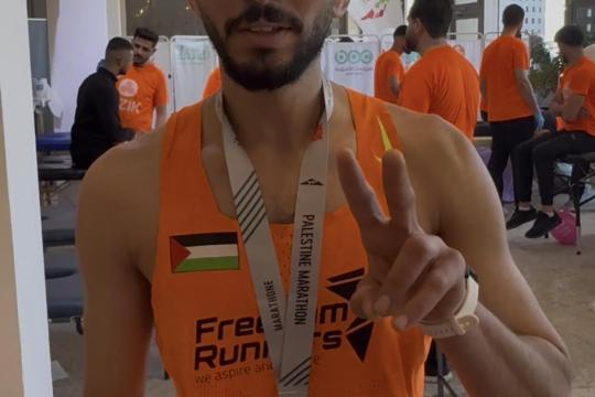 أسير محرر ينتزع وصافة ماراثون فلسطين الدولي بعد 32 شهرا بالأسر