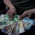 وزارة الإقتصاد تحرر  56 إخطاراً لمحال رفضت تداول العملات الورقية شرق غزة