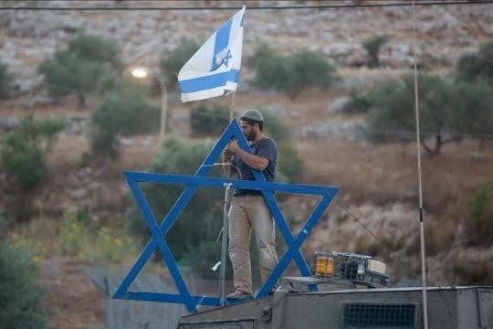 مستوطنون يقيمون بؤرة جديدة قرب تجمع بدوي بالخان الأحمر شرق القدس