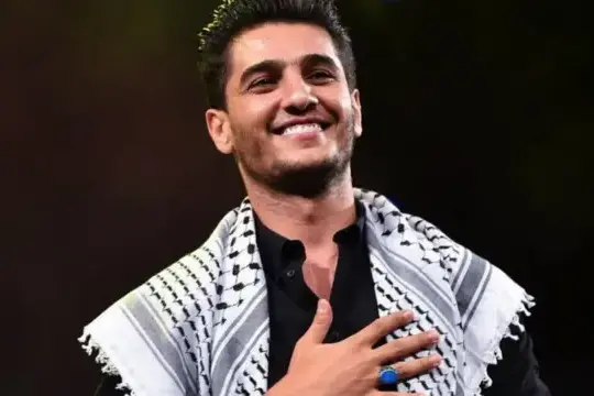 جدل المخيمات وإلغاء حفلات محمد عساف بأمريكا.. ماذا حدث؟